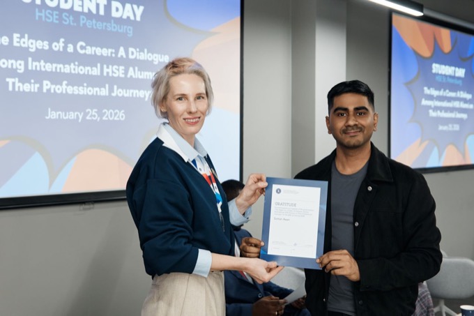 Receiving a certificate of gratitude at the HSE St Petersburg alumni career panel, January 2026